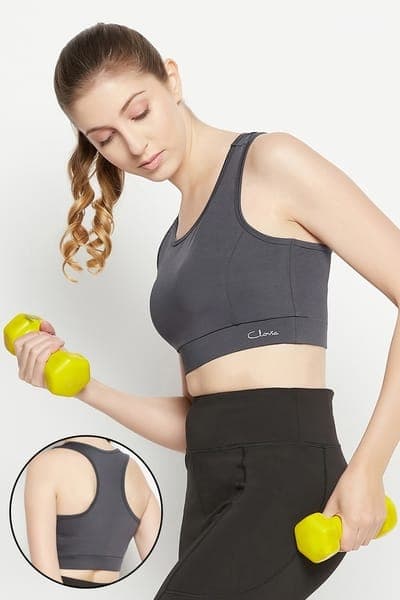 Medium Impact Padded Racerback Sports Bra in Dark Grey | Clovia