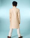Tasteful Beige Sherwani Ensemble