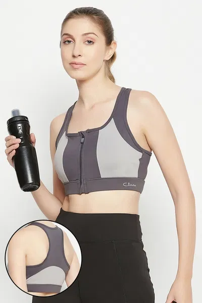 Medium Impact Padded Colourblocked Racerback Sports Bra in Dark Grey with Front Zipper | Clovia Medium Impact Padded Colourblocked Racerback Sports Bra in Dark Grey with Front Zipper | Clovia