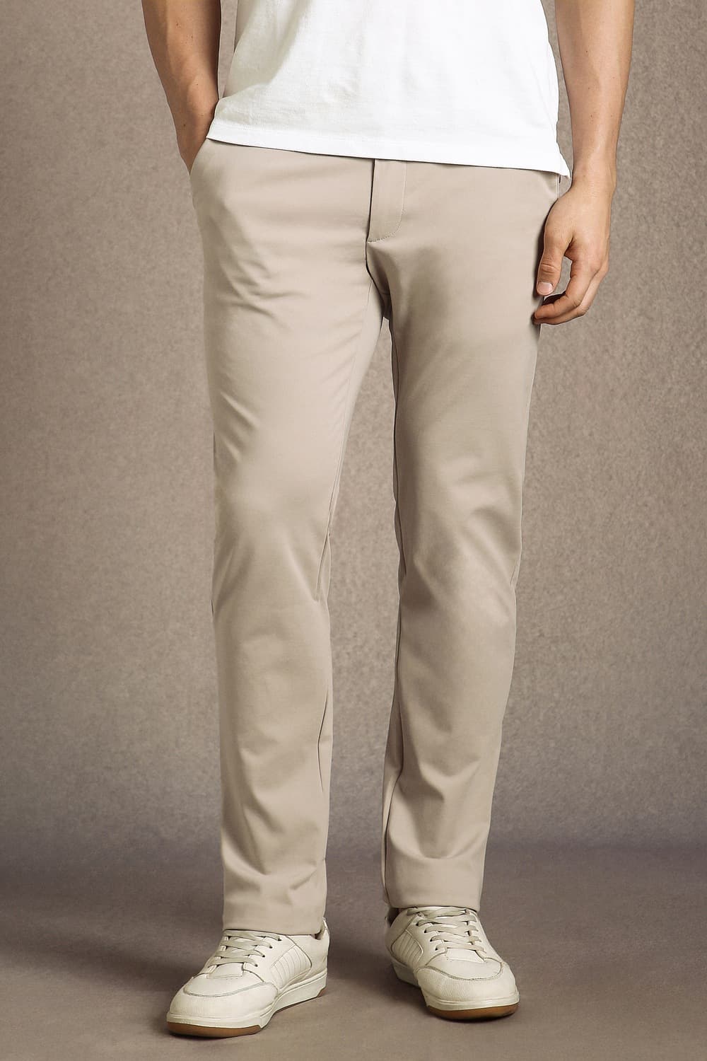 Men Beige Slim Tapered Fit Solid Flat Front Casual Trousers | Louisphilippe Men Beige Slim Tapered Fit Solid Flat Front Casual Trousers | Louisphilippe