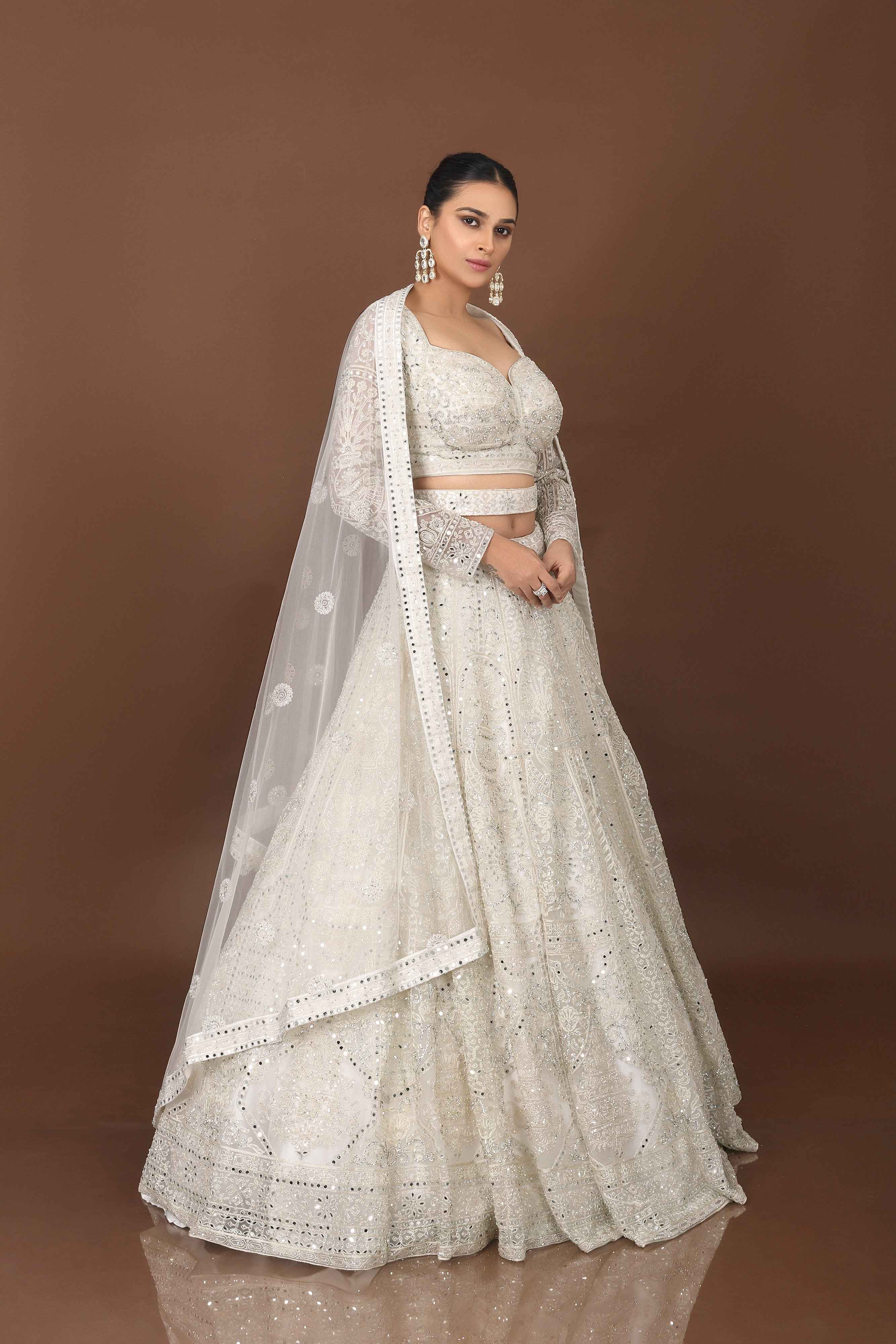 Divine Flair: White Mirror Work Celebrity Inspired Designer Lehenga Choli | Palkhifashion Divine Flair: White Mirror Work Celebrity Inspired Designer Lehenga Choli | Palkhifashion