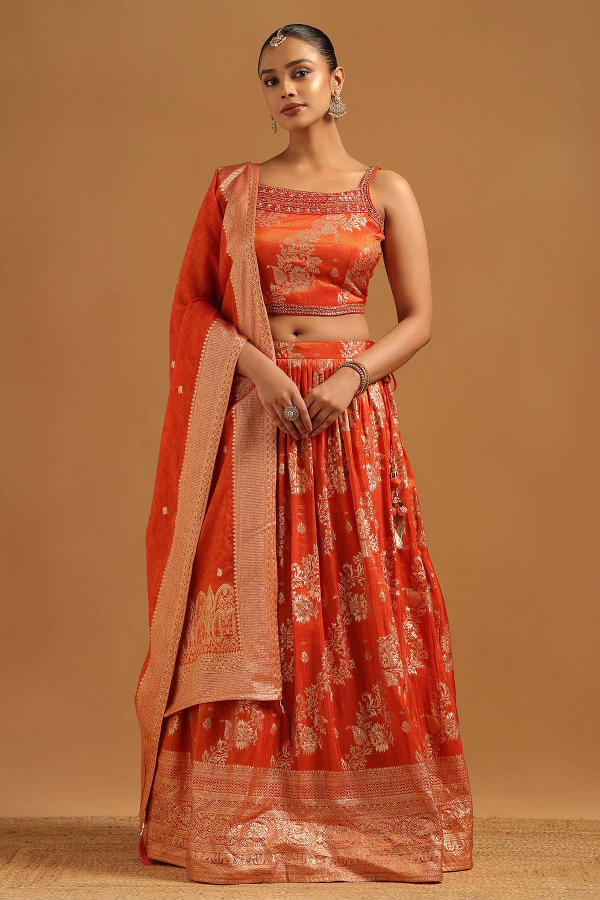 Rust Brocade Zari Woven Lehenga With Mirror & Stone Rust Brocade Zari Woven Lehenga With Mirror & Stone