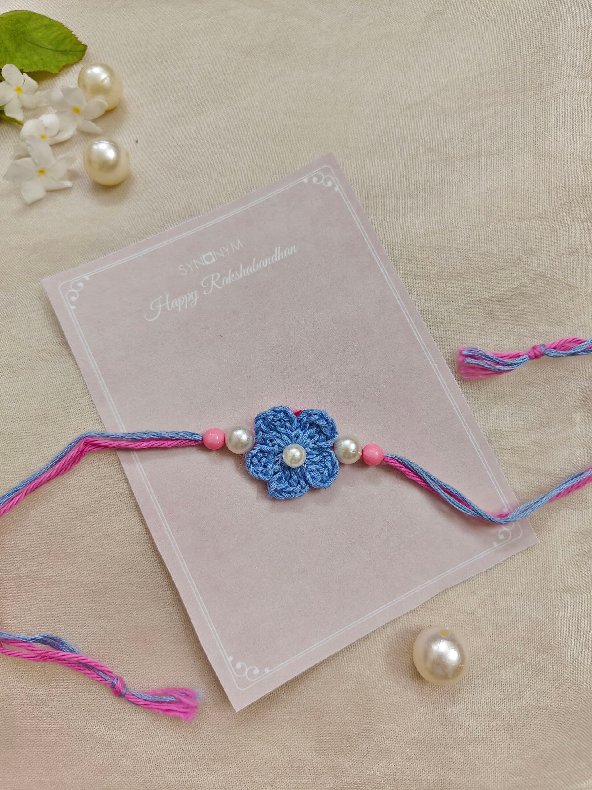 Blue crochet rakhi | Synonym Clothing Blue crochet rakhi | Synonym Clothing