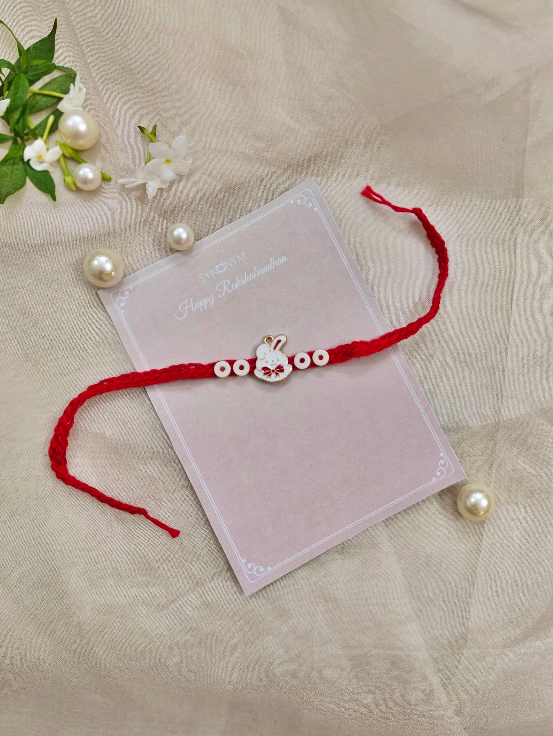 Red bunny crochet rakhi | Synonym Clothing Red bunny crochet rakhi | Synonym Clothing