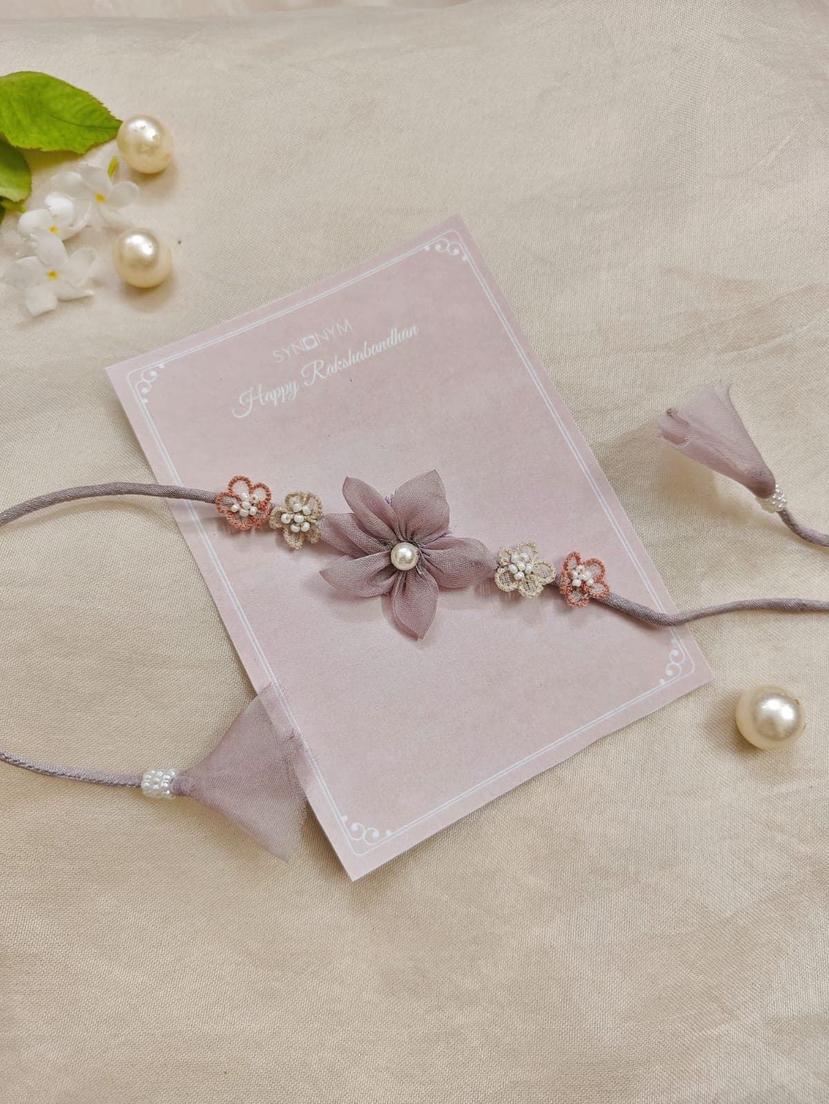 Mauve Floral Rakhi | Synonym Clothing Mauve Floral Rakhi | Synonym Clothing
